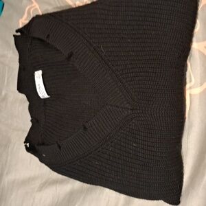 A black knitted sweater